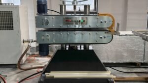 Haul-off machine for continuous plastic curtain track profile extrusion