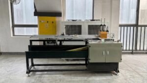 Automatic cutting machine for plastic curtain track profile extrusion